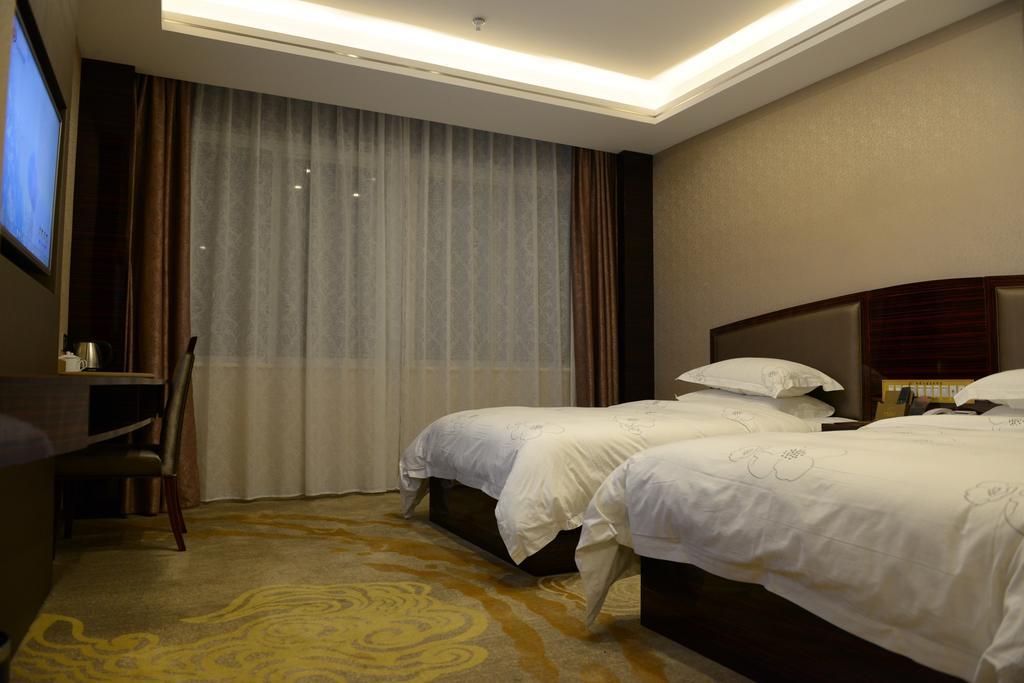 Tie Cheng Hotel Canton Chambre photo